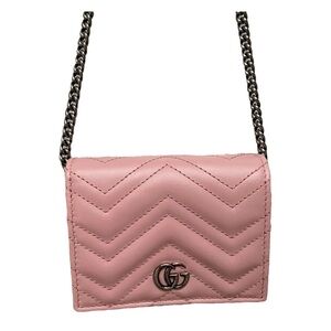 Pink Gucci marmont chain flap leather crossbody bag.